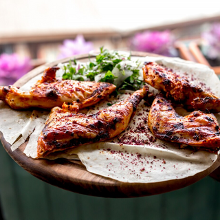 Delicious Tandoori Chicken with a sprinkle of toasted chilli